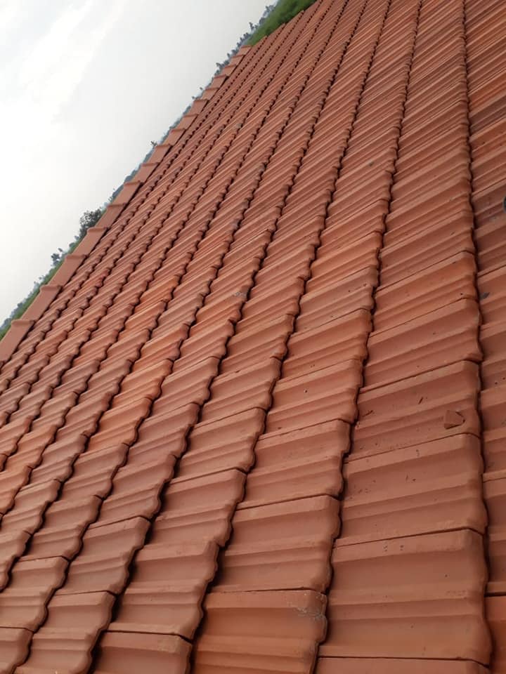 Clay roofing tiles versus Decra stone coated sheets cost and weight comparison